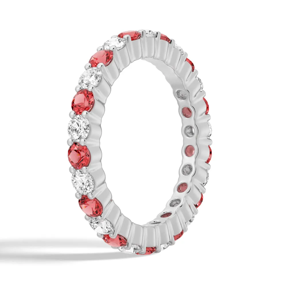 Prong-Set Ruby and White Sapphire Eternity Wedding Band