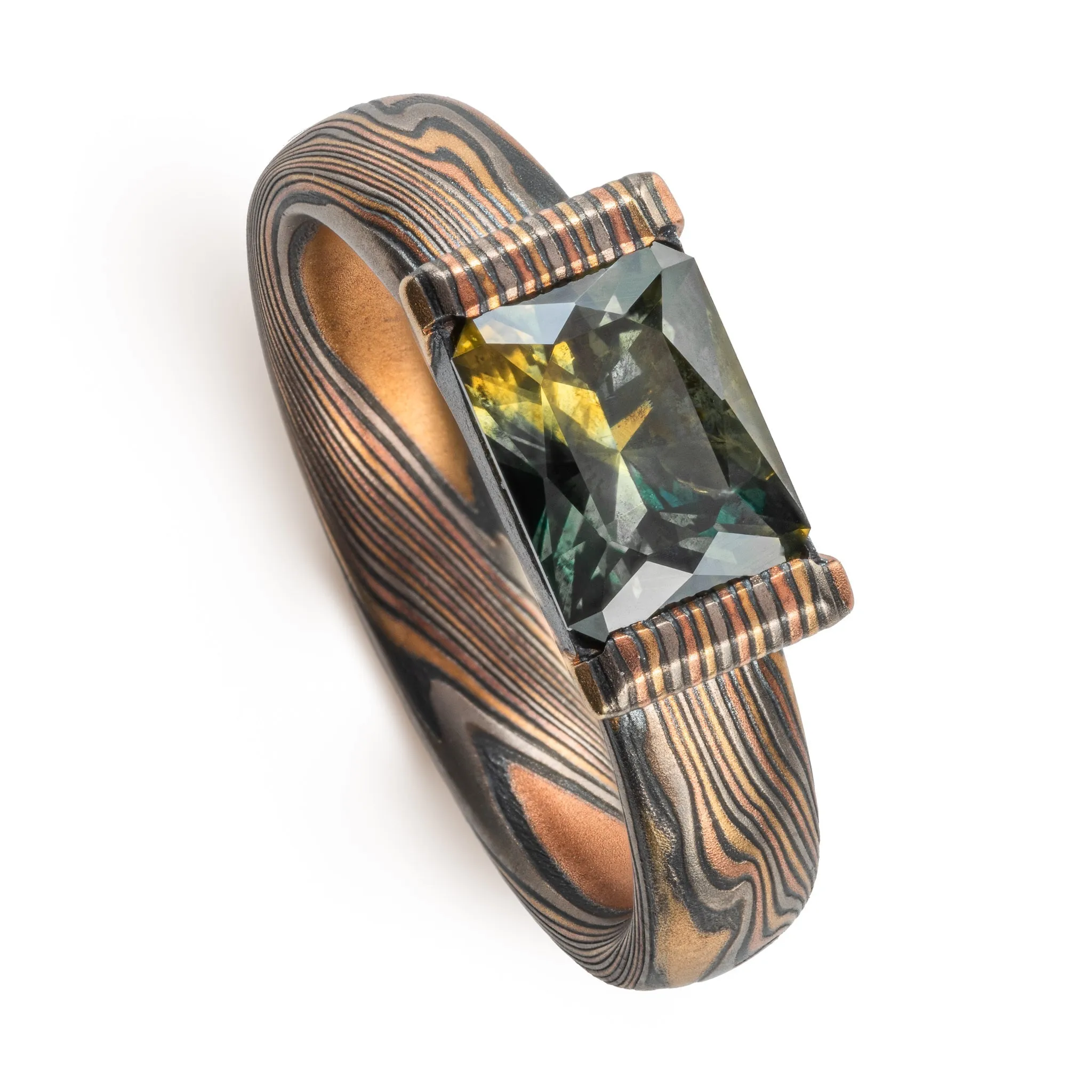 Woodsy Mokume Gane Ring Set in Firestorm Palette and Twist Pattern with Montana Sapphire