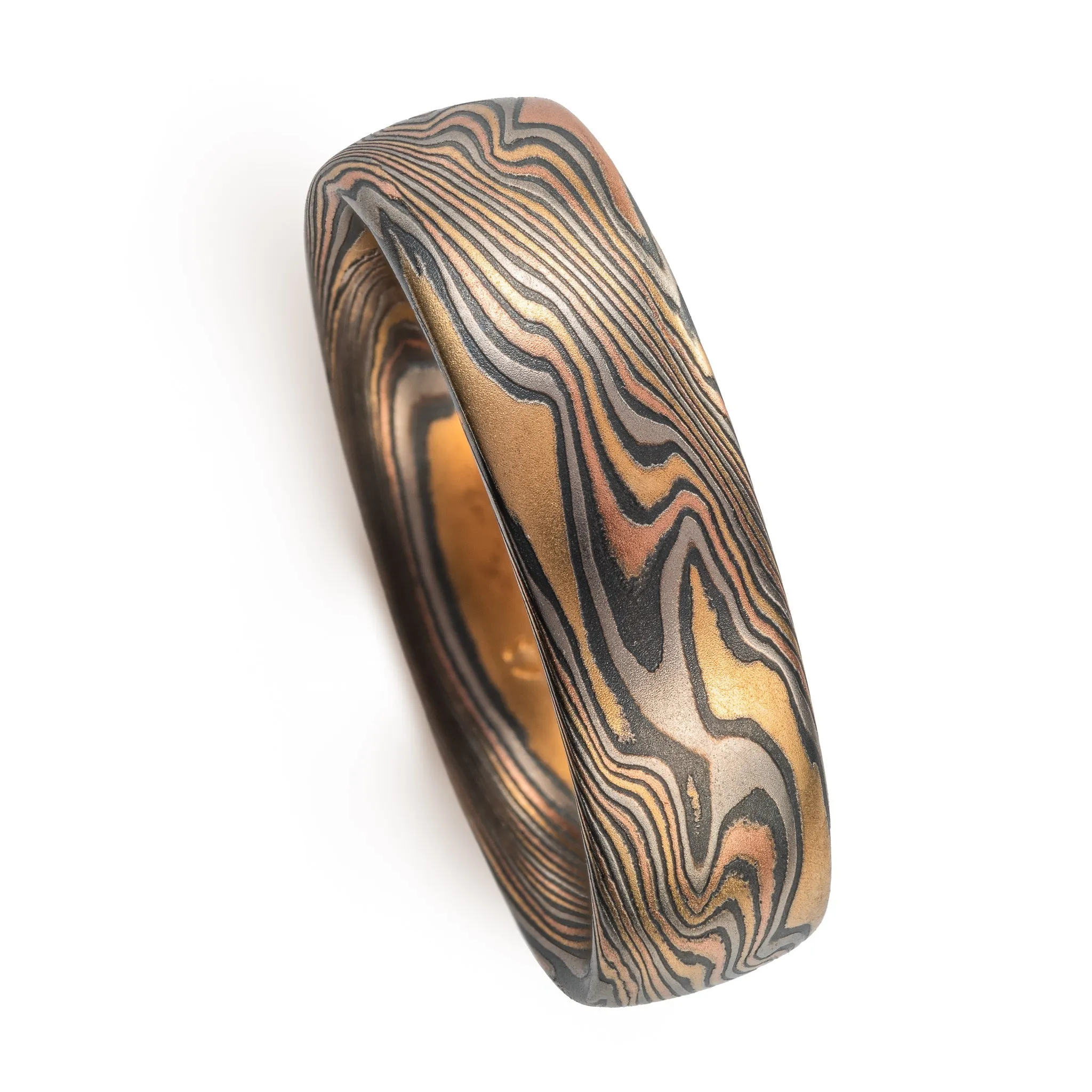 Woodsy Mokume Gane Ring Set in Firestorm Palette and Twist Pattern with Montana Sapphire