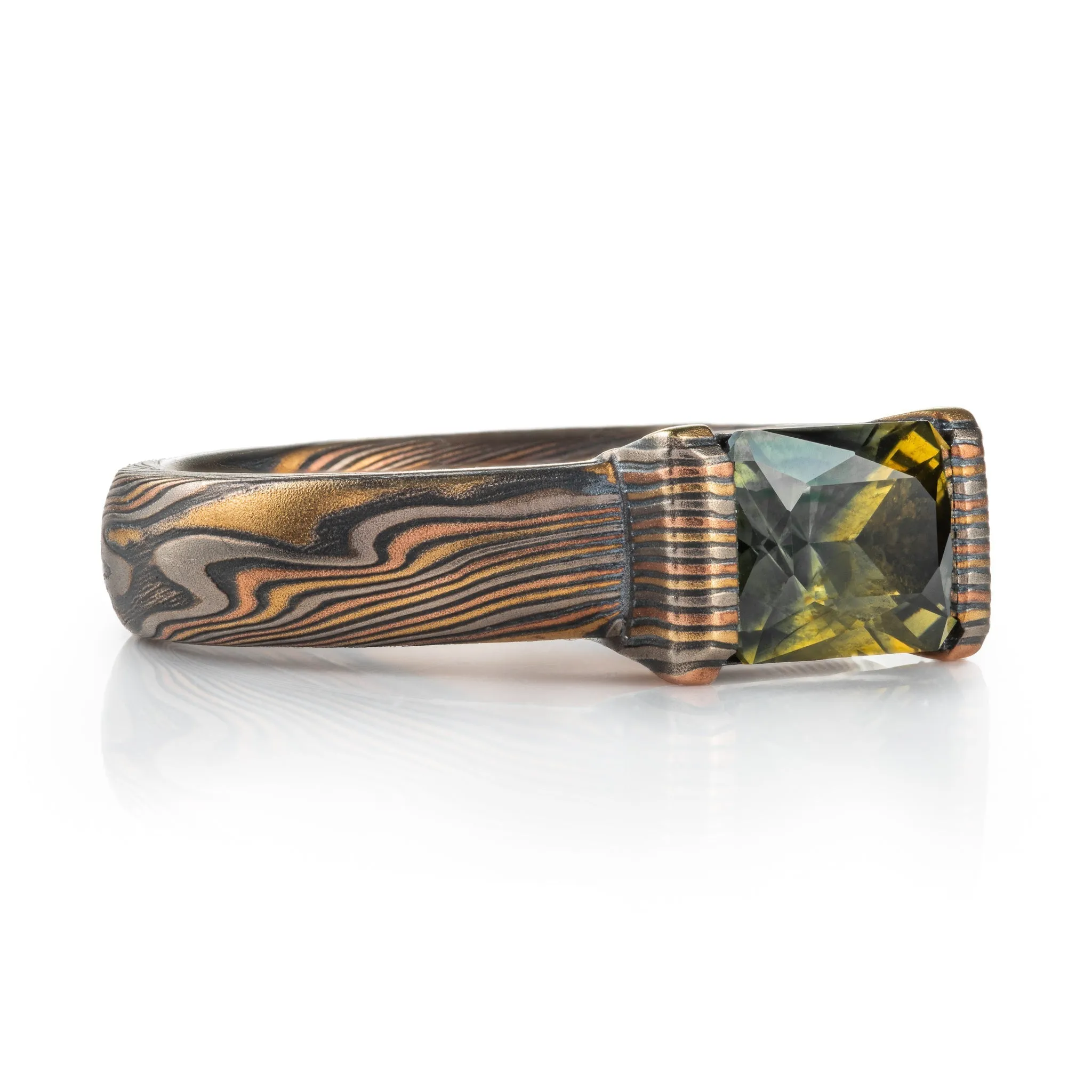 Woodsy Mokume Gane Ring Set in Firestorm Palette and Twist Pattern with Montana Sapphire